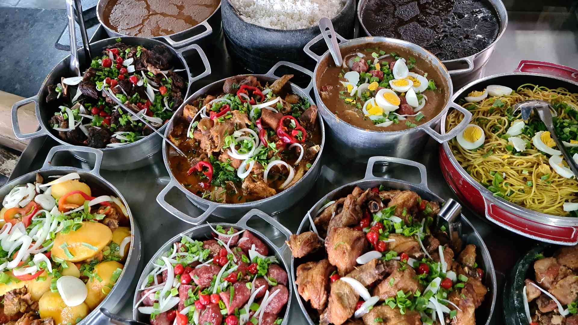 Multiple Minas Gerais Brazil dishes in pots laid out on a table, used as featured image for climate impact update 2026-1