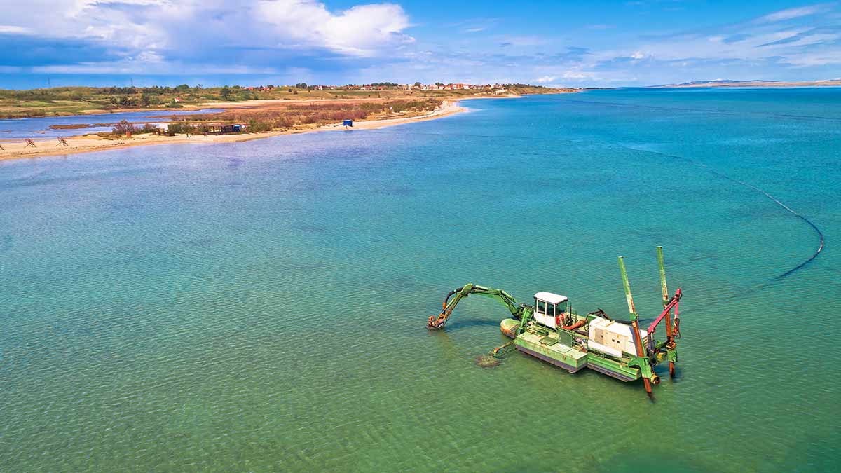 A boat dredging sand off the Coast of Nin, Croatia
