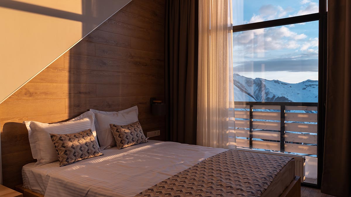 Hotel room with a view of a snowy mountain destination