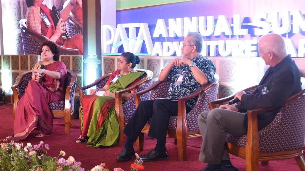 Panelists speaking at the Pacific Asia Travel Association's Annual Summit and Adventure Mart 2023, a carbon neutral event