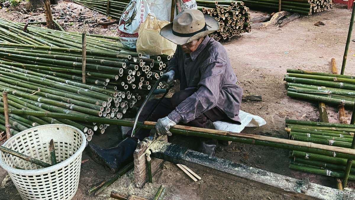 Cutting bamboo to create biochar carbon removals as part of the WongPhai project in Thailand