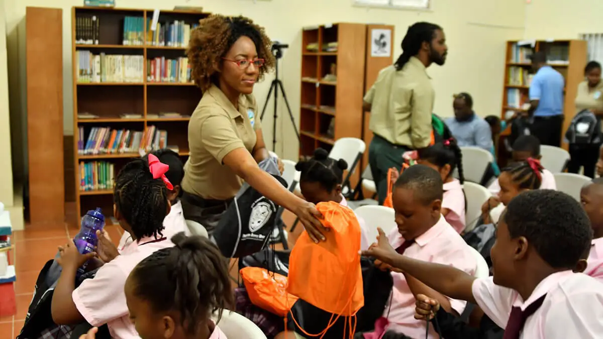 Phynora distributes reusable items to children