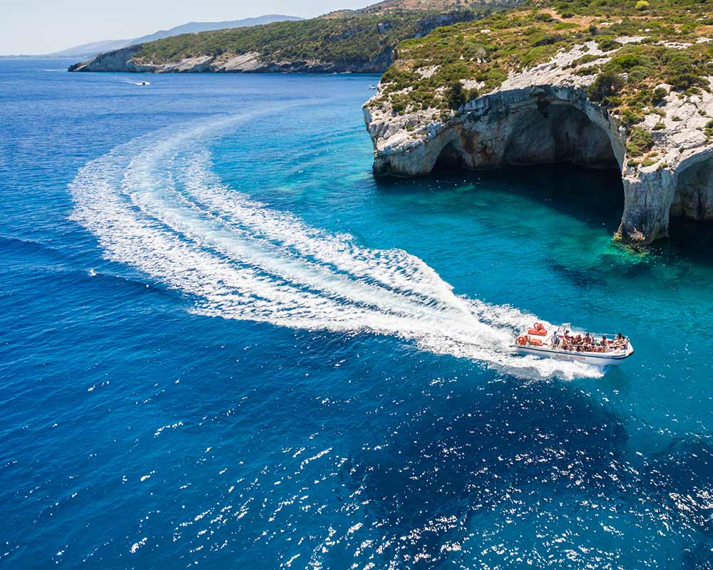 A motorboat tour along a coastline in Greece