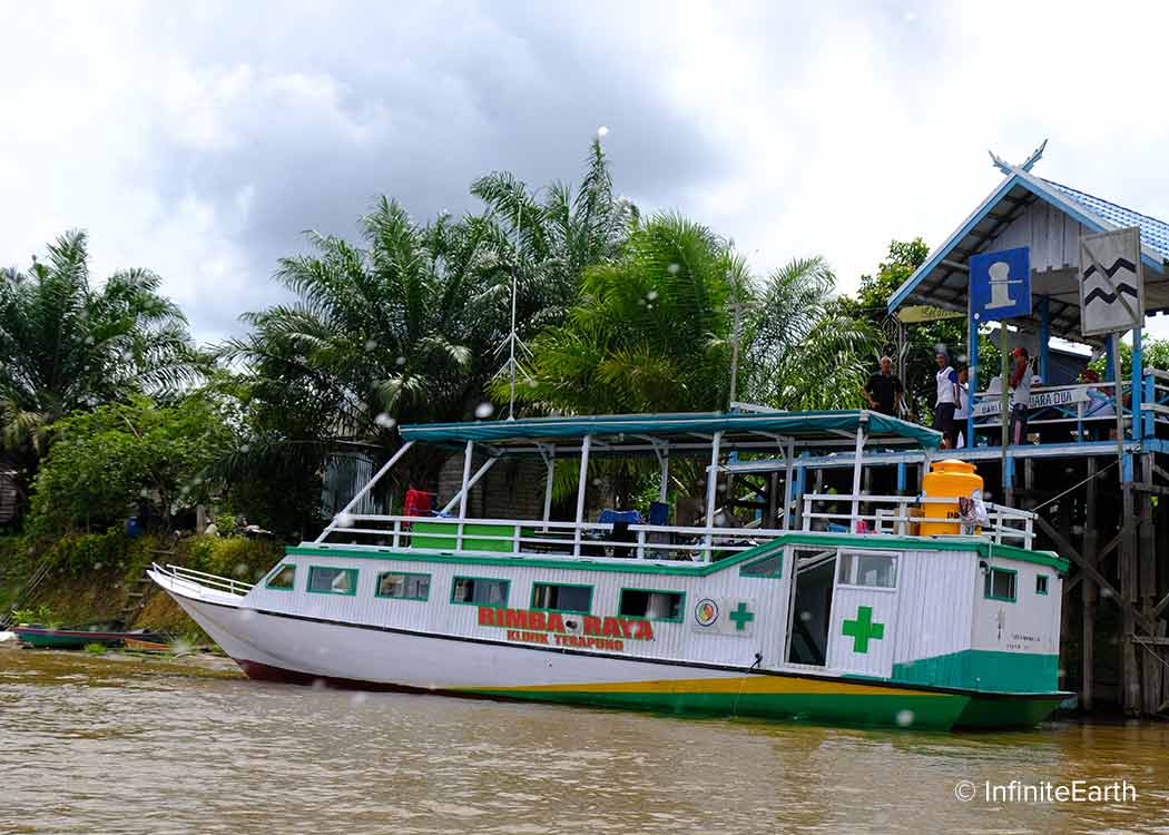 Floating medical clinic at a village dock, a community initiative of Rimba Raya Biodiversity Reserve carbon offset project