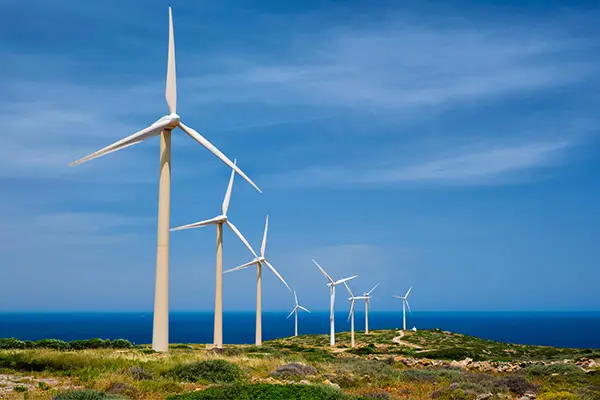 Wind farm generating clean, renewable energy on and island.