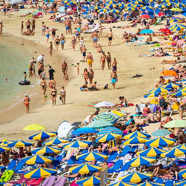 Overtourism at a crowded beach destination