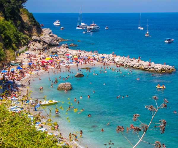 An overtouristed beach in Capri, Italy