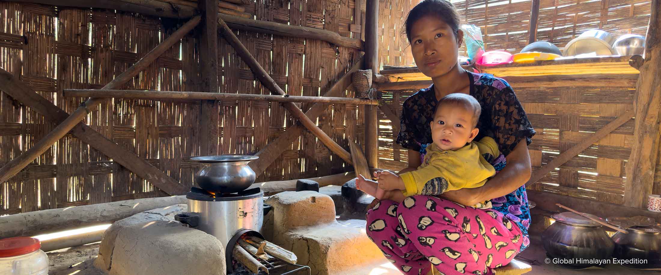 Family in Clean Cookstoves carbon offset project in Garo Hills, India.