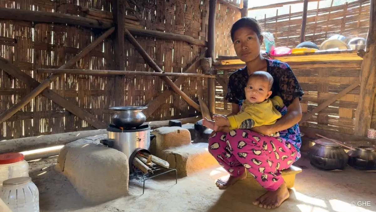 Family in Clean Cookstoves carbon offset project in Garo Hills, India.