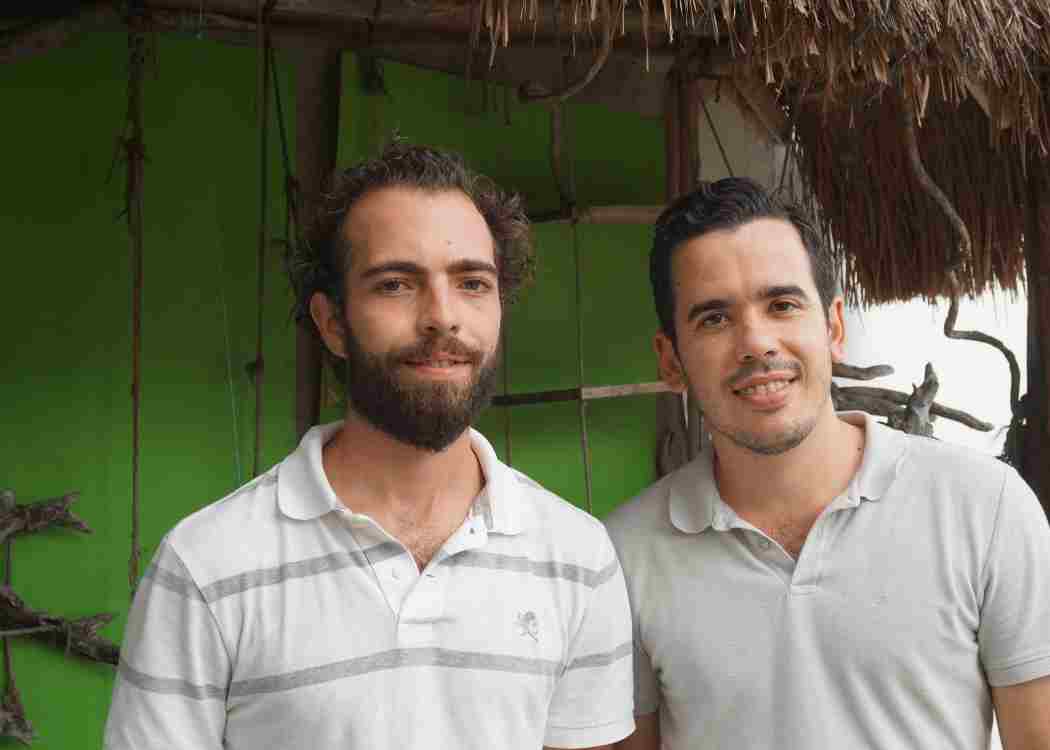 Fernando Heredia and Sergio Briceño of Cozumel Island pose for a photo. These tour operators are involved in the island's new reef tourism training program