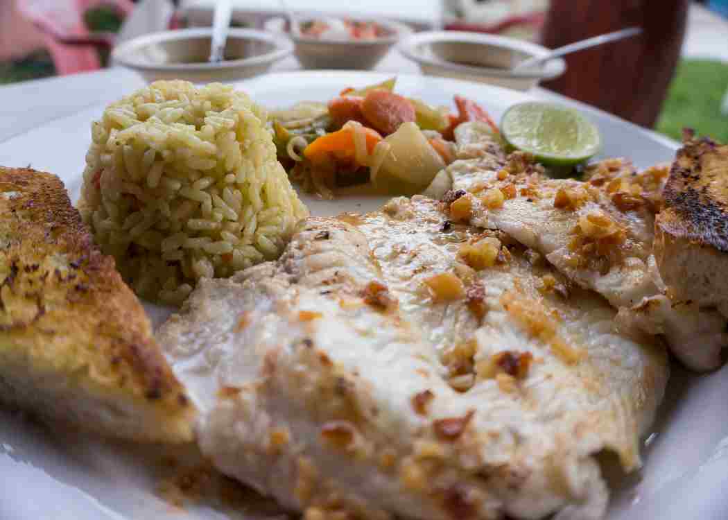 Restaurants in Cozumel serve lionfish fillets to hungry locals and tourists to help remove invasive fish from the reef