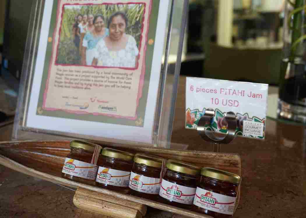Local women sell homemade fruit preserves at Quintana Roo hotels as a part of MARTI's sustainability initiatives.