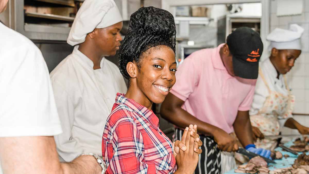 Workers prepping food in St. Kitts restaurant
